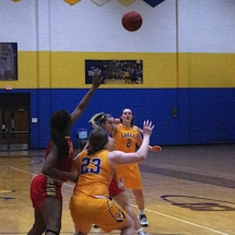 MAKENZIE BRAY LOBS THE ROCK INSIDE TO MATTISON RAYMAN N FIRST QUARTER ACTION TUESDAY EVENING AGAINST FERRIS STATE.