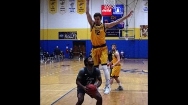 Nigel Colvin gets ready to go up for two in first half action Sunday against MI Tech.