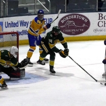 BENITO POSA TAKES A SHOT IN FIRST PERIOD ACTION AGAINST NMU SUNDAY AFTERNOON.