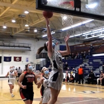 Claire Erickson scores in first quarter action against Newberry Monday evening.
