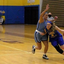 MAKENZIE BRAY DRIVES TO THE HOOP AS BROOKE DITTO CREATES SOME CONTACT. LSSU LOST BOTH WEEKEND GAMES TO NORTHWOOD.