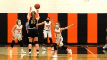 Ally Schultz fires in one of her eight threes in Monday eveing action in Rudyard.