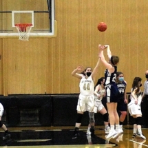 Claire Erickson drills the three in Wednesday Night action....SS Marie in St. Ignace
