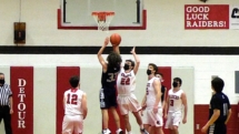 Dominic Morse makes the shot in the final seconds of the first quarter in Tuesday night action in DeTour.