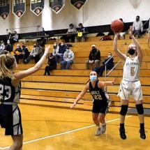 Emma Hart drills the baseline shot in Wednesday Night action....SS Marie in St. Ignace