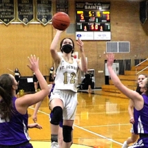 Hallie Marshal goes strong to the basket in first quarter action in St. Ignace Tuesday Night.