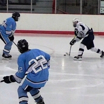 JACK SWAN TAKES A SHOT IN FRIDAY NIGHT ACTION AGAINST PETOSKEY.