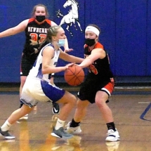 KATIE RAHILLY REACHES IN TO TAP THE BALL AWAY FROM ELIZABETH JOHNSON IN FRIDAY NIGHT ACTION IN BRIMLEY.