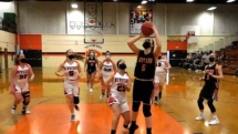 Sara Beelen goes up for two in District Final Action in Newberry.
