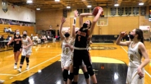 Sara Beelen puts in the shot in fourth quarter action. Rudyard upset the Saints Friday night with a score of 51-47.