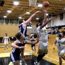 Tyrel Matson goes up strong for the basket Wednesday evening. SSM at St. Ignace.