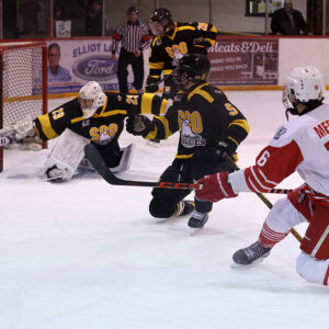 Soo Eagles Reid Ramsay makes save on Red Wings player