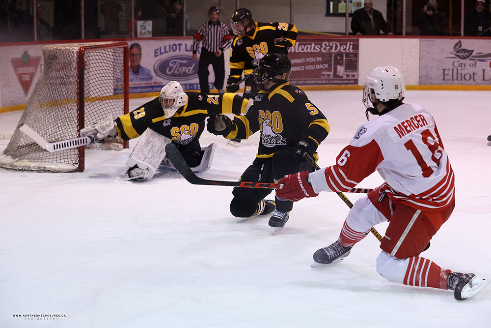 Soo Eagles Reid Ramsay makes save on Red Wings player